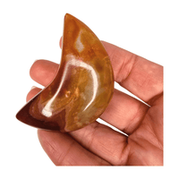 Carnelian crescent moon carving for passion, creativity, and motivation