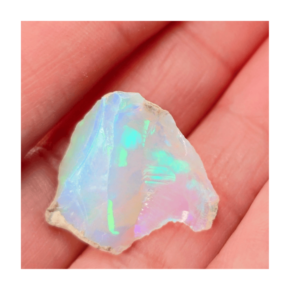 Ethiopian Rainbow Opal with fiery flash for illumination, confidence, and creativity