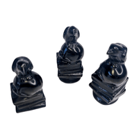 Obsidian Raven with Books