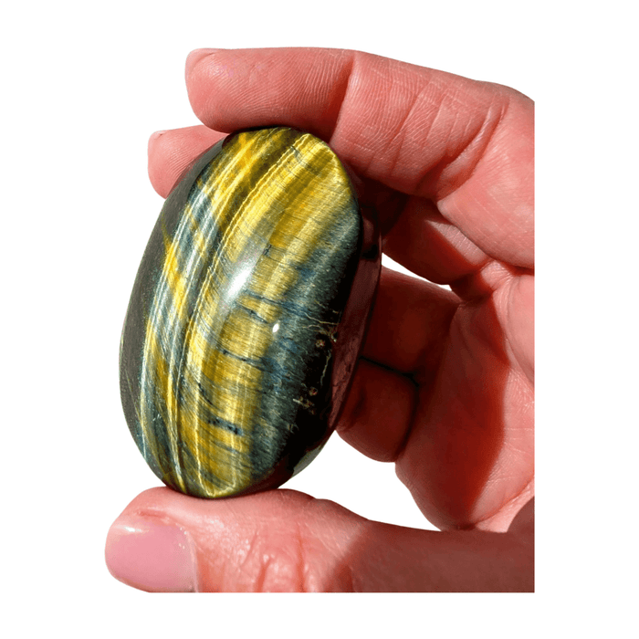 Tiger’s Eye palm stone for strength, courage, confidence, and grounding