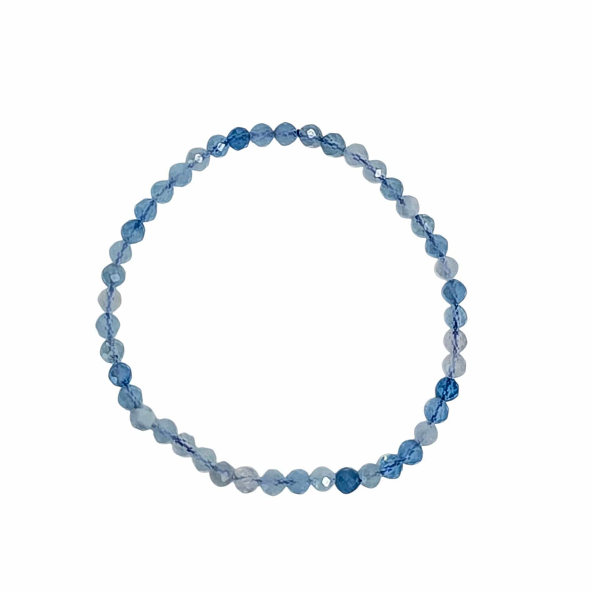 A beaded stretch bracelet made of faceted round beads in various shades of blue, from light icy blue to medium royal blue, arranged in a circular shape on a plain white background.