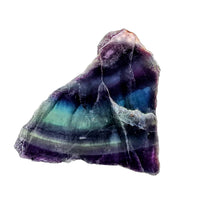 Fluorite slab with purple, blue, and green banded crystal face
