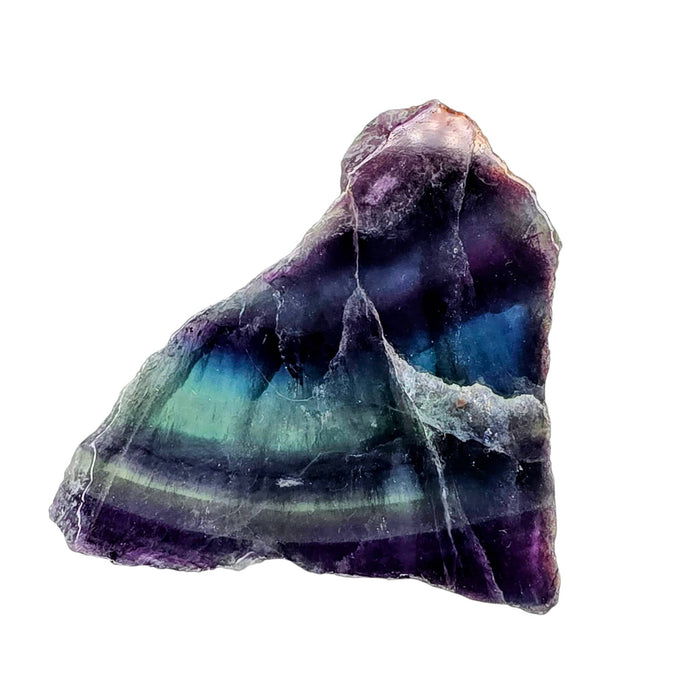 Fluorite slab with purple, blue, and green banded crystal face