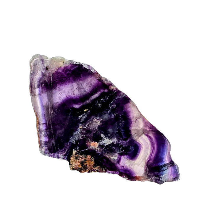 Fluorite slab showing dark purple top with blue-green iridescent bands